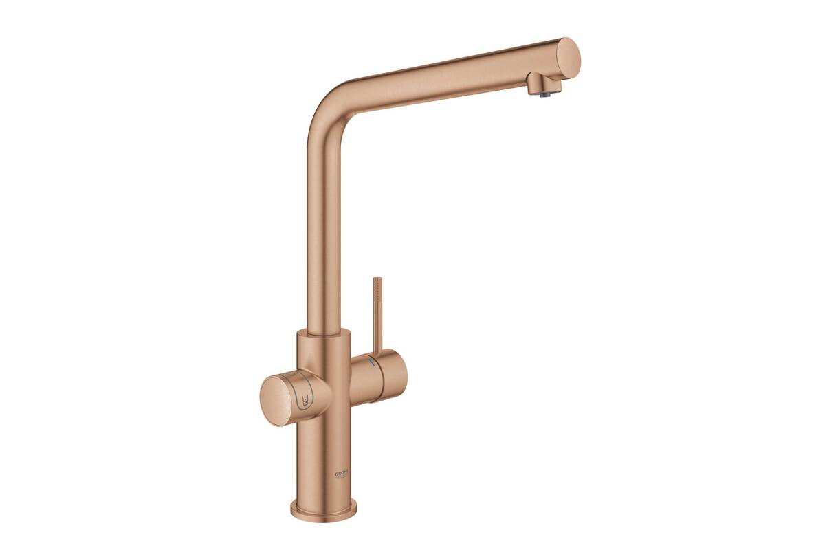 Die Armatur Grohe «Blue» für gefiltertes sprudelndes oder stilles kühles Wasser begeistert in verschiedenen Farben, wie beispielsweise «warm sunset».Grohe.